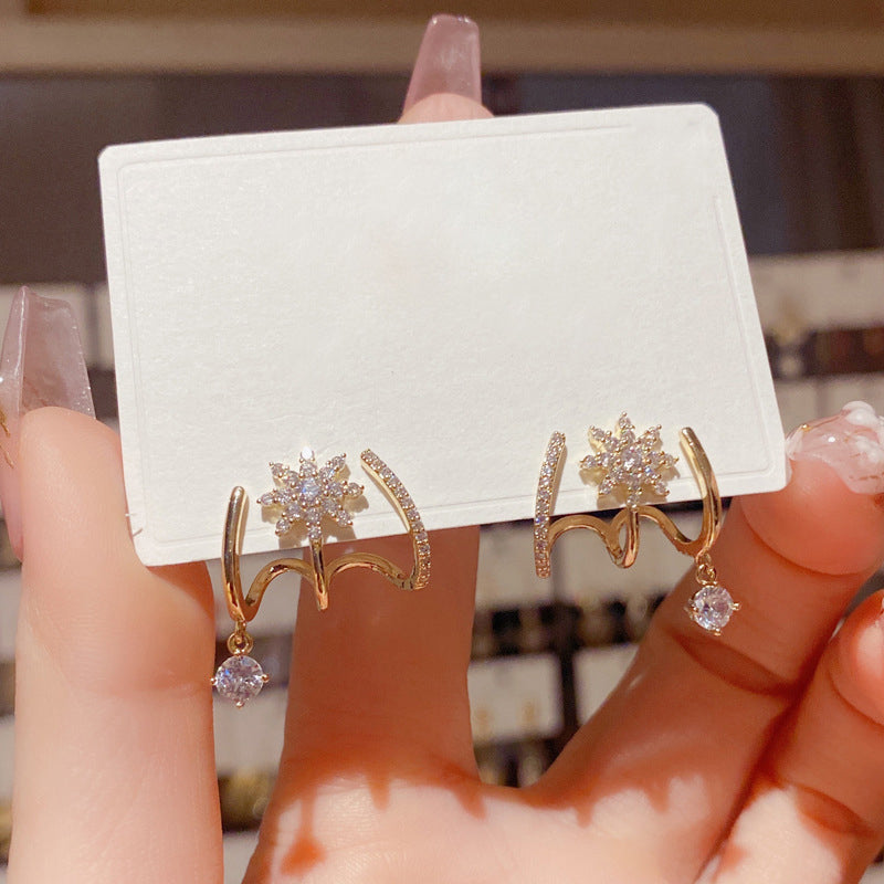 Boucles d'oreilles griffes scintillantes pour femme