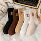 🔥Chaussettes douillettes brodées pour femmes avec motif de vache des Highlands