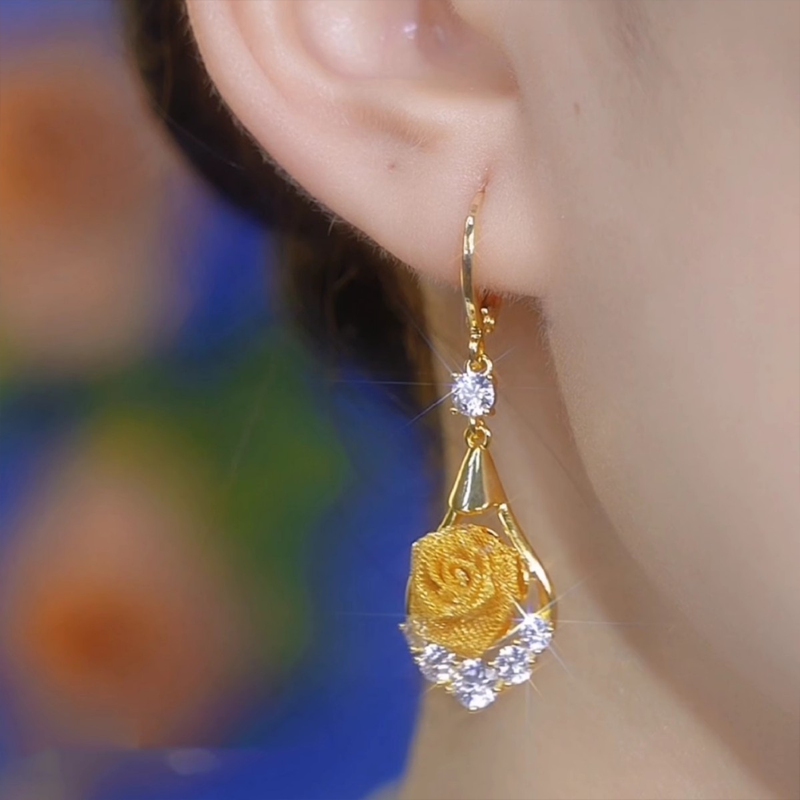 Boucles d'oreilles élégantes en maille rose