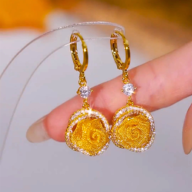 Boucles d'oreilles élégantes en maille rose