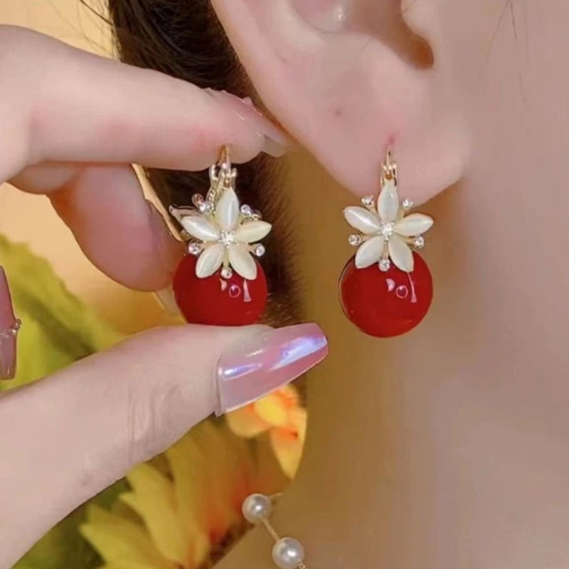 Boucles d'oreilles délicates en perles et fleurs