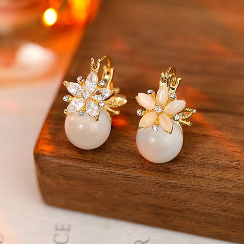 Boucles d'oreilles délicates en perles et fleurs