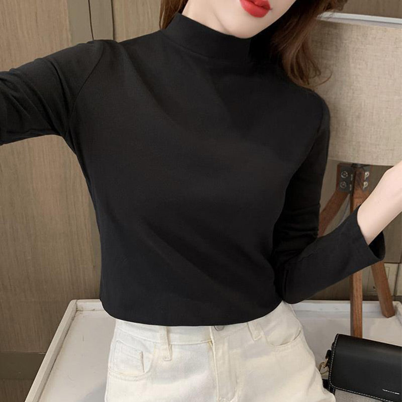 Haut confortable uni à manches longues et col mi-haut pour femme