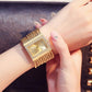 ⌚50% RÉDUCTION MAINTENANT !✨Montre Quartz à Strass avec Bracelet Pompon💎Élégante & Éclatante, Cadeau Parfait pour Célébrations🎁