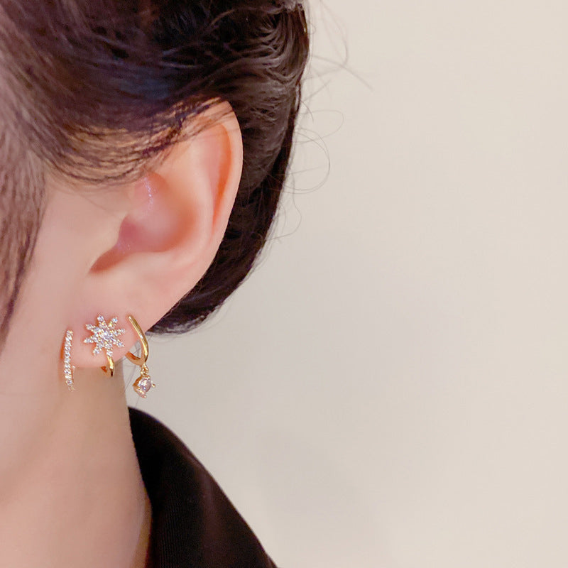 Boucles d'oreilles griffes scintillantes pour femme