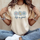 T-shirt graphique "Life is Good" avec motif de marguerite