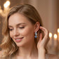 Boucles d'oreilles créoles pendantes célestes ton argent