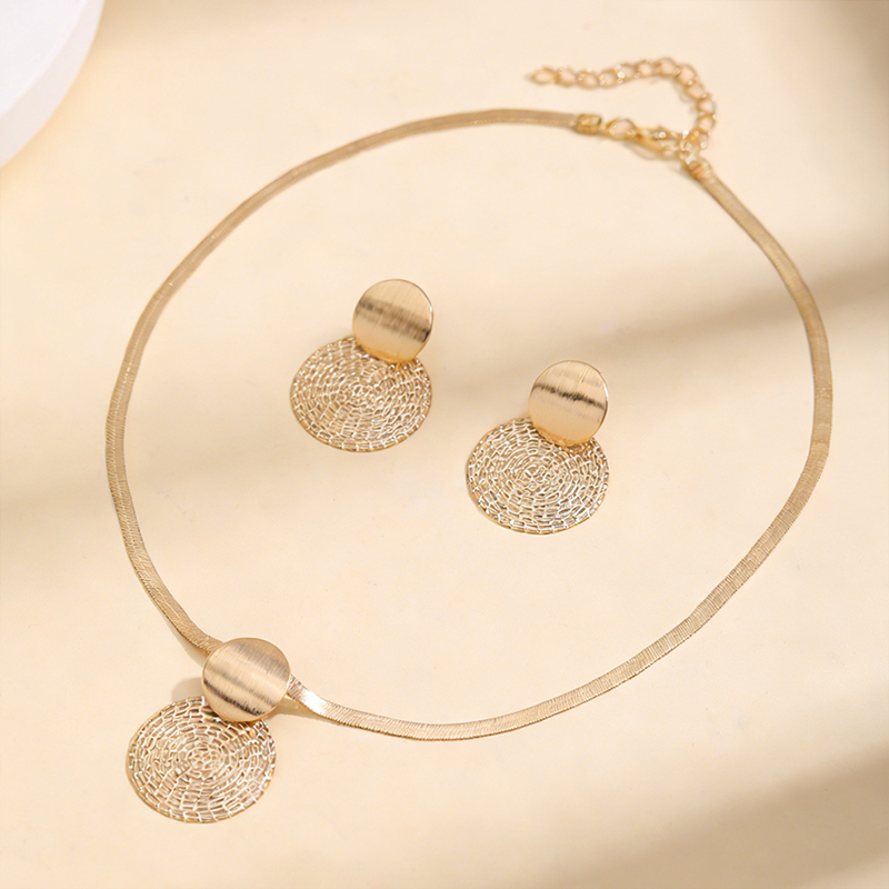 Parure collier & boucles d'oreilles chic moderne