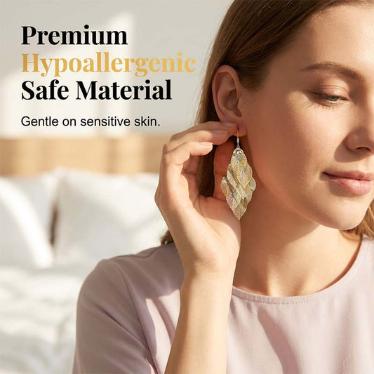 📢📢50 % DE RÉDUCTION⏰Boucles d'oreilles élégantes pour femme, en forme de feuilles ajourées en cascade