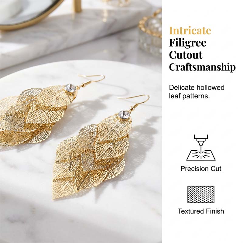 📢📢50 % DE RÉDUCTION⏰Boucles d'oreilles élégantes pour femme, en forme de feuilles ajourées en cascade