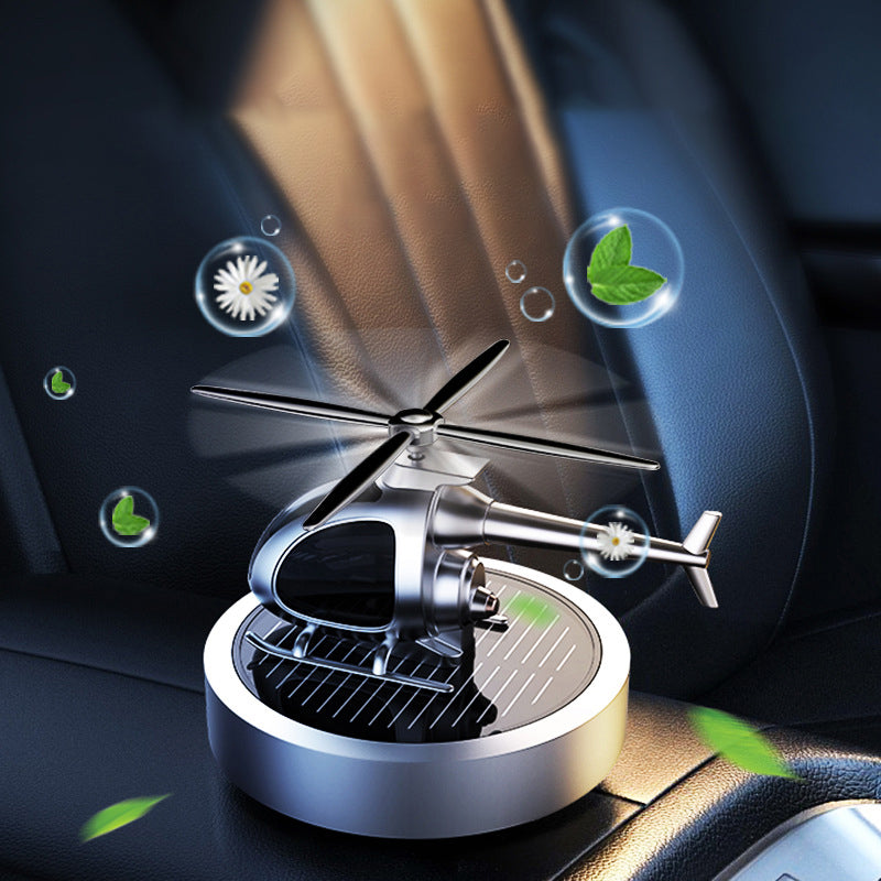 🚁 50% DE RÉDUCTION ⚡ Désodorisant hélicoptère solaire en métal – Rotation solaire & déco de voiture stylée – Diffuseur de fraîcheur, parfait pour tableau de bord ou bureau – écologique et amusant 🌿