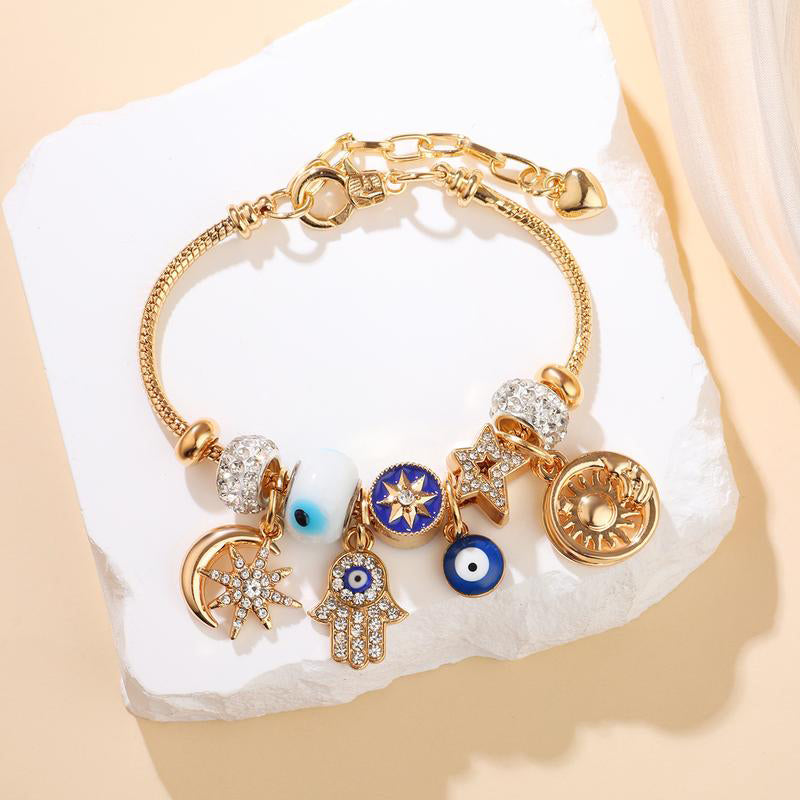 Bracelet à breloques célestes soleil et lune